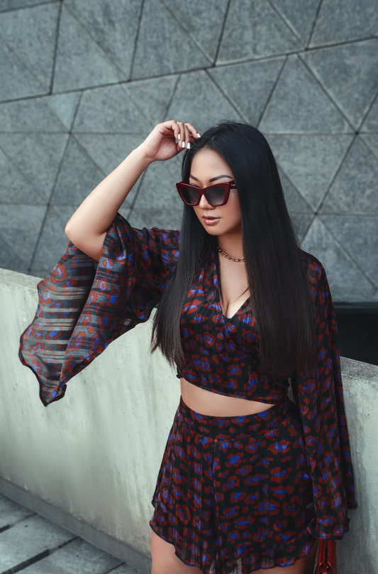 Model wearing two piece set named Allure.